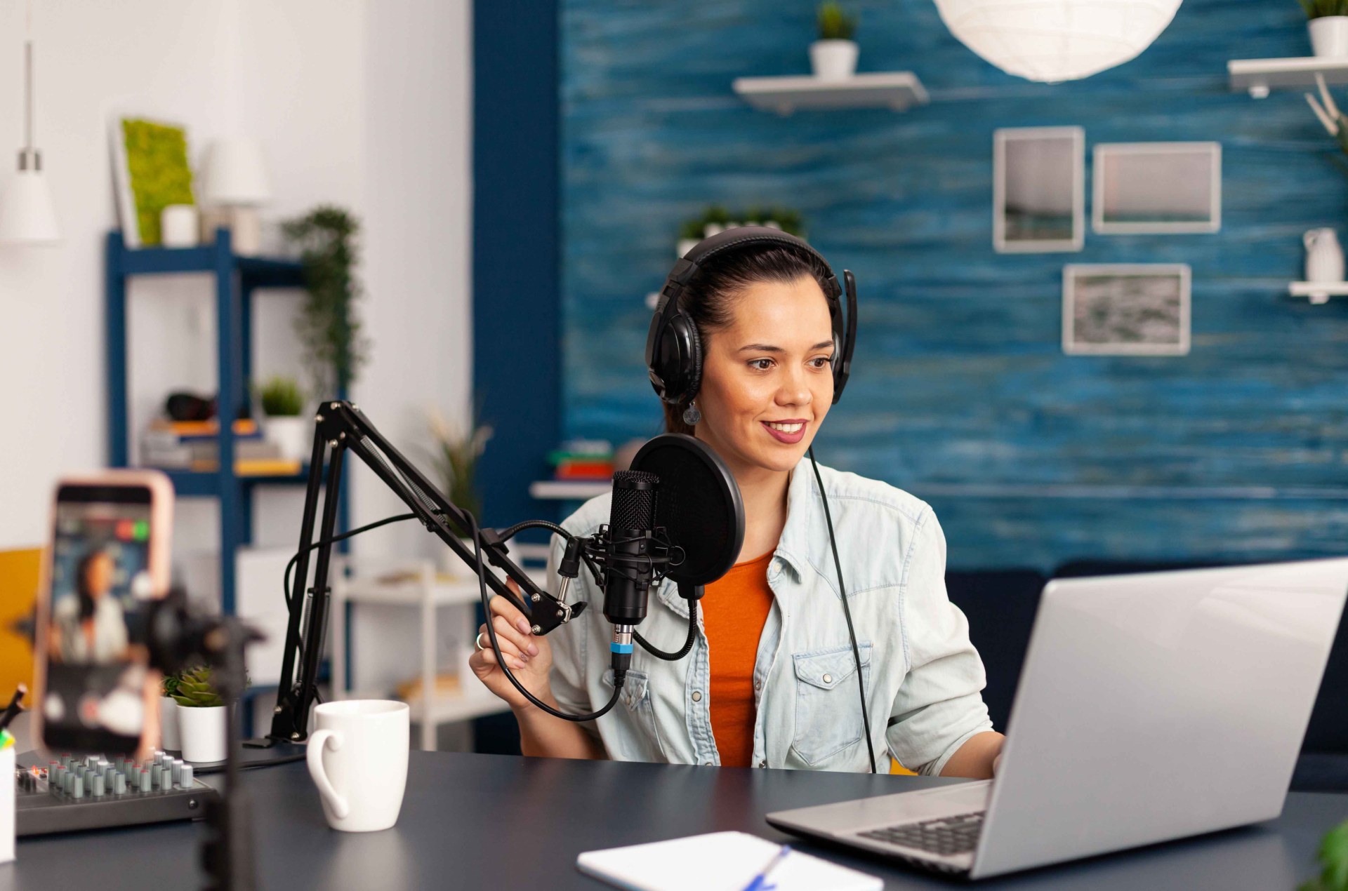 A girl recording audio for Clubhouse