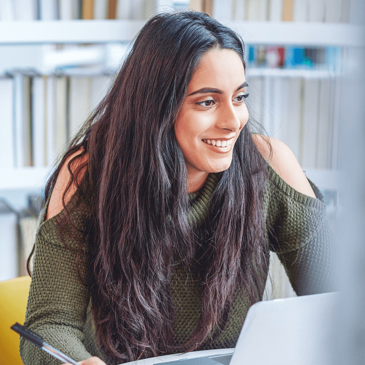 Girl using a laptop for work