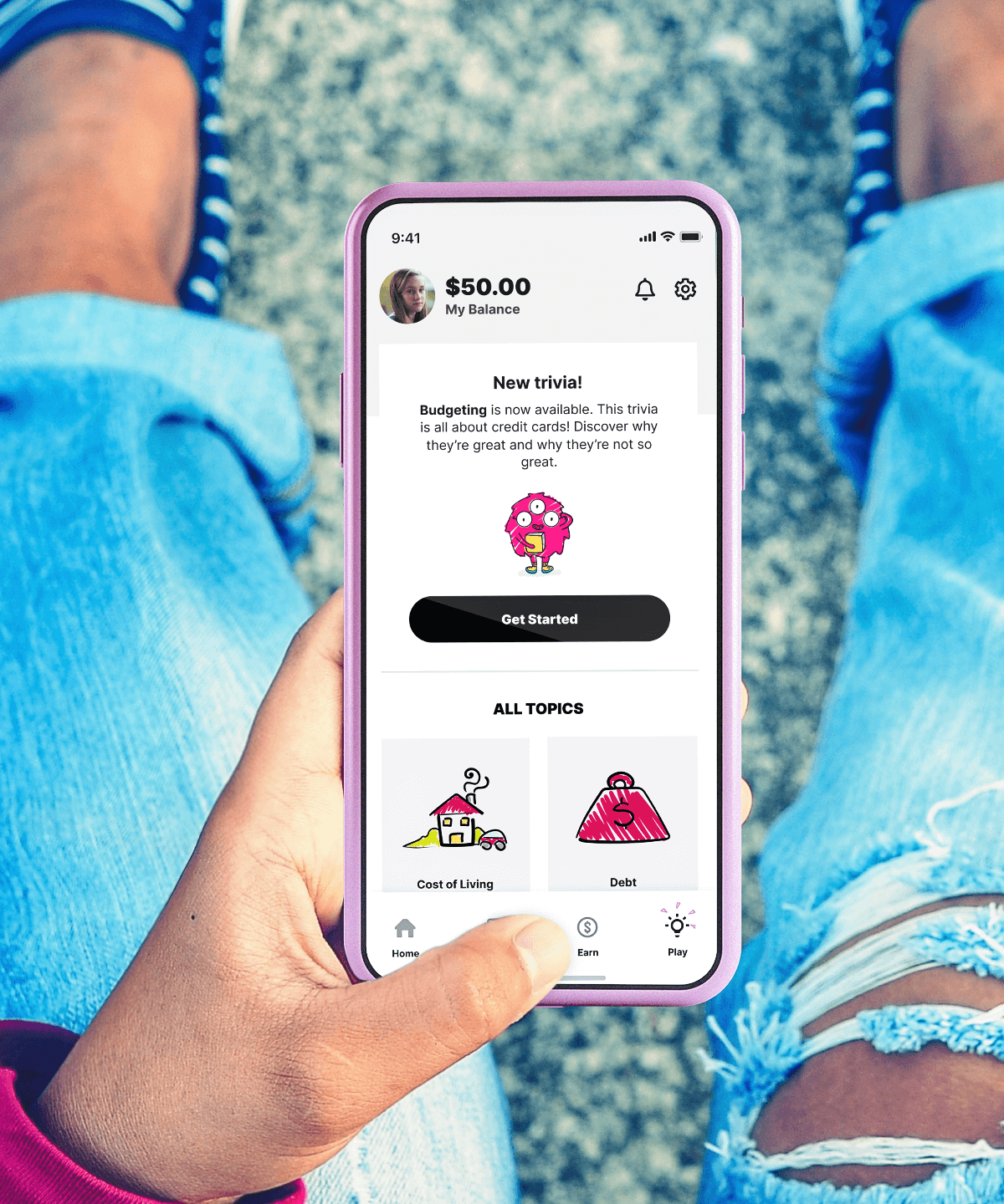A child using the money trivia quiz in the Mydoh money app