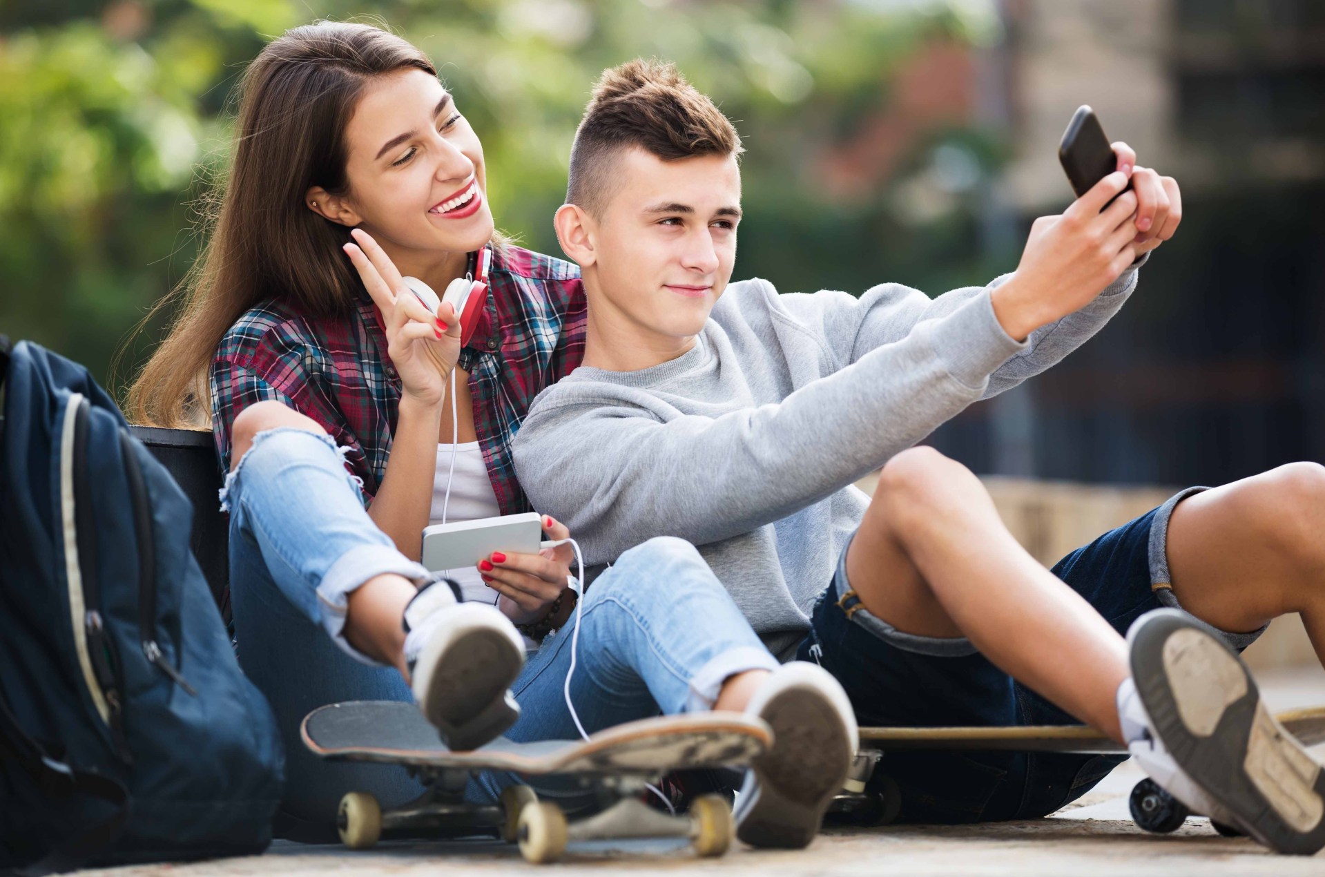 Teenagers taking a selfie on Snapchat