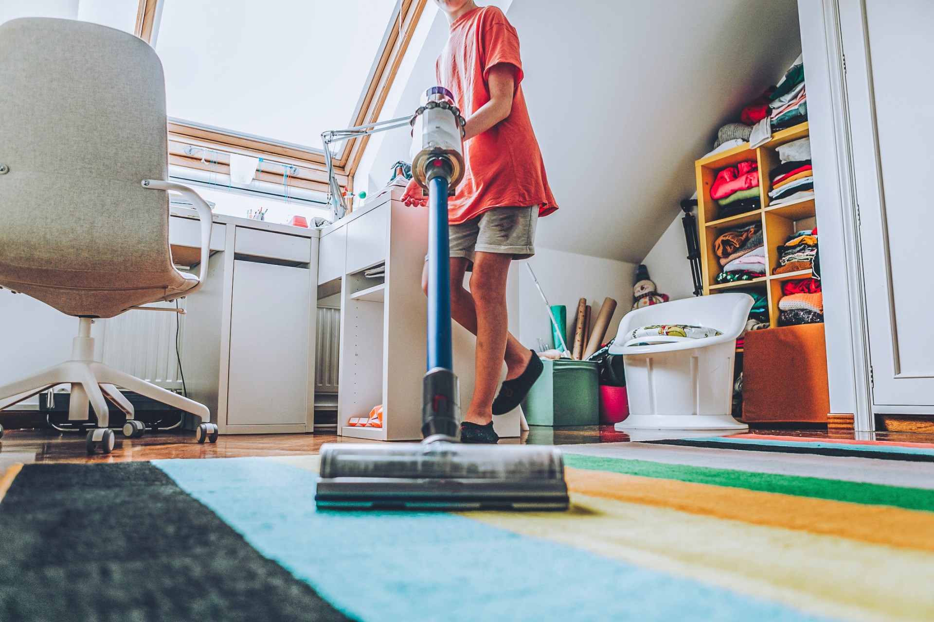 teen vacuuming house