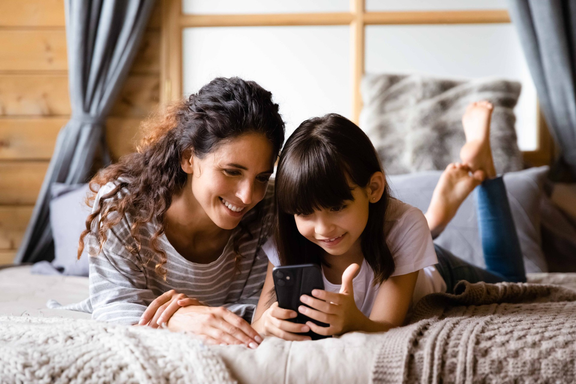 mother and daughter on phone