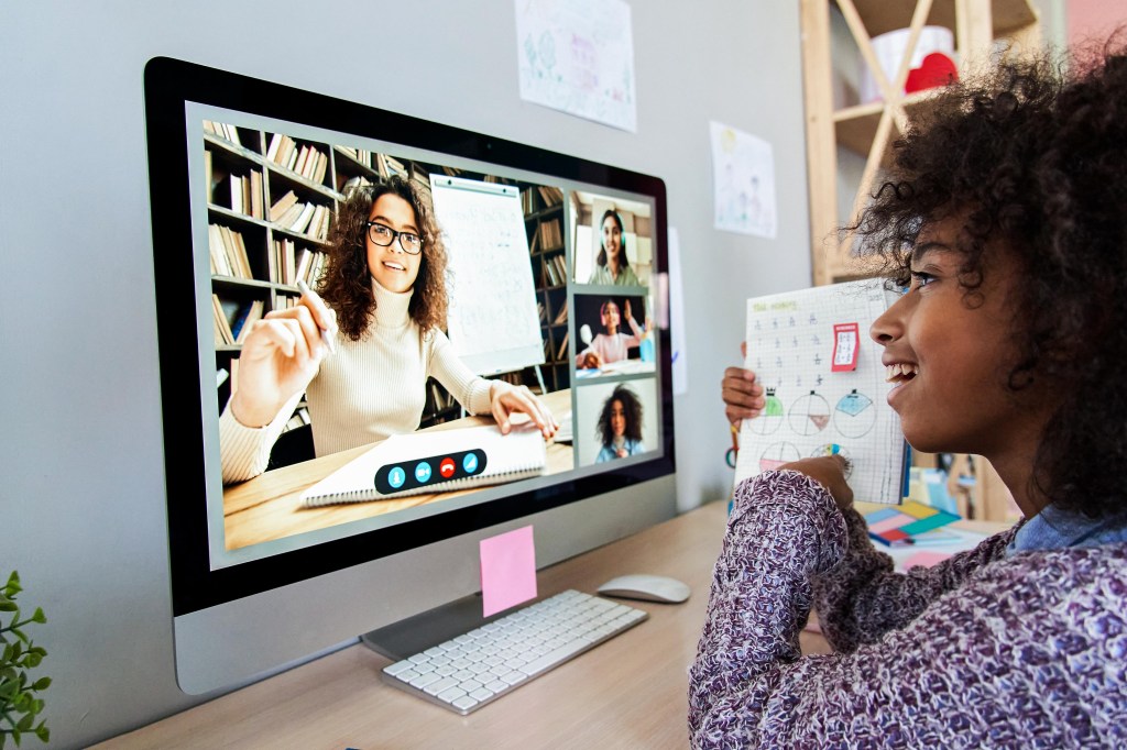 preteen girl learning online