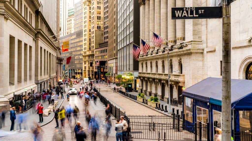Street view of Wall Street and New York Stock Exchange