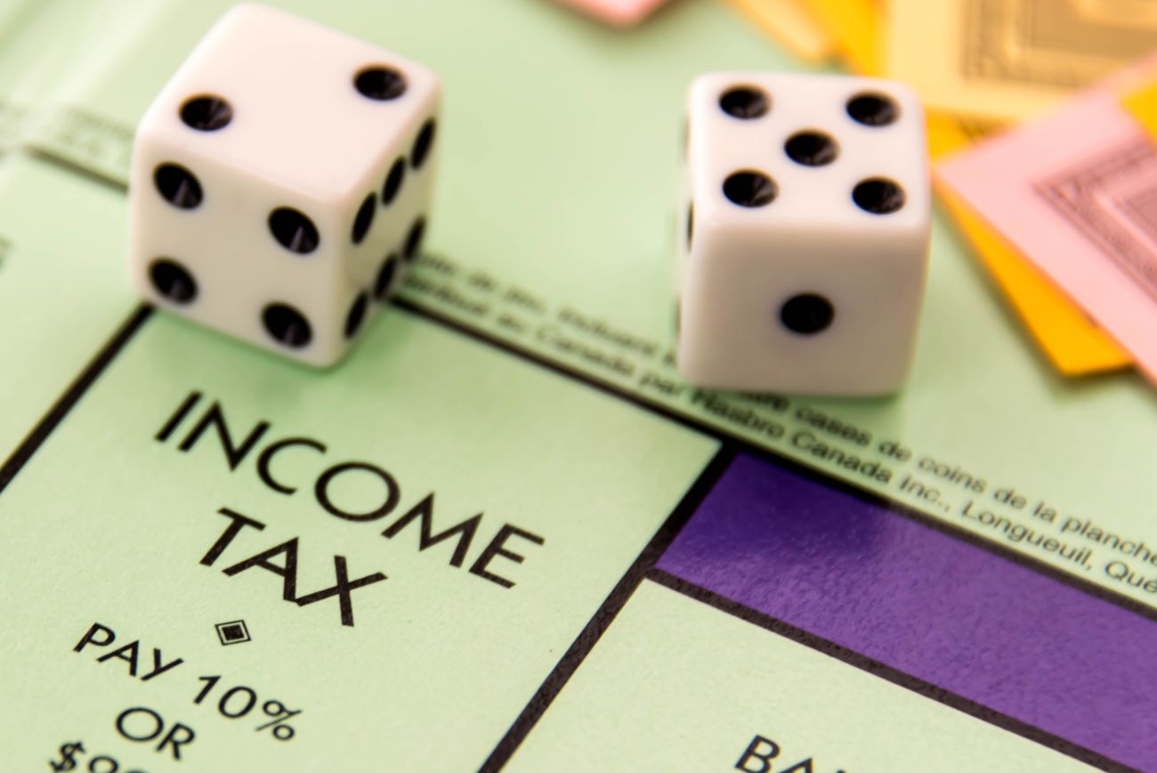 Income Tax square on Monopoly board and two dice