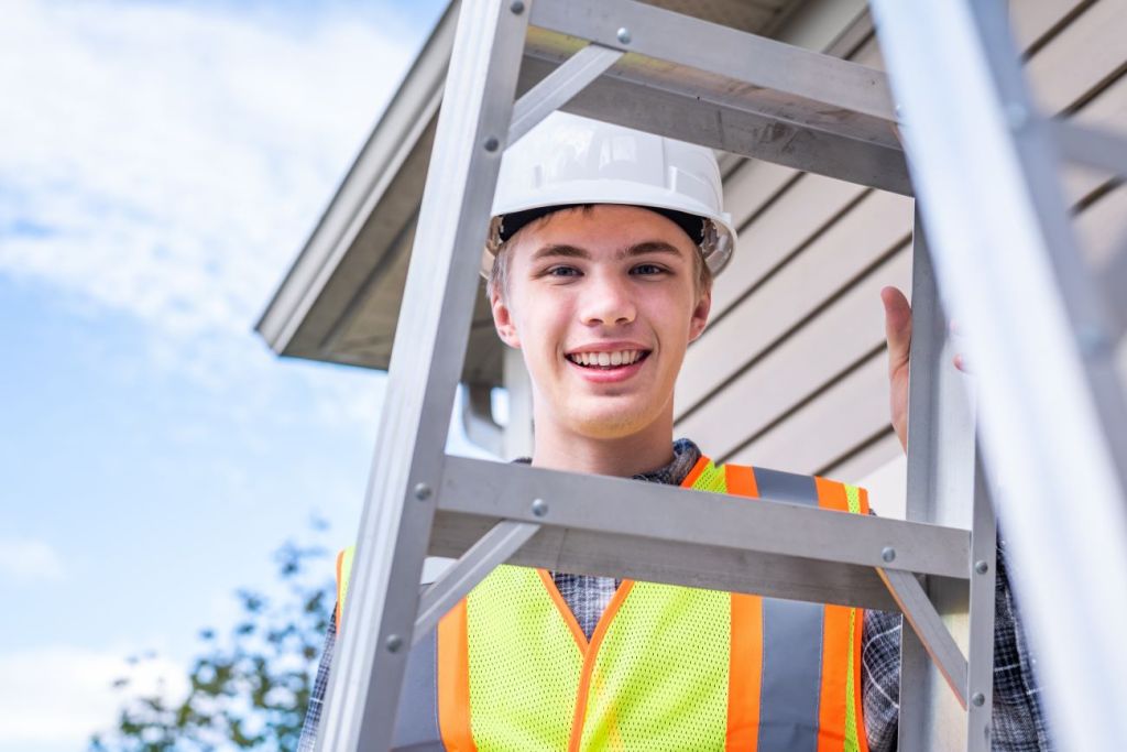 A teen boy earning income as a part-time contractor
