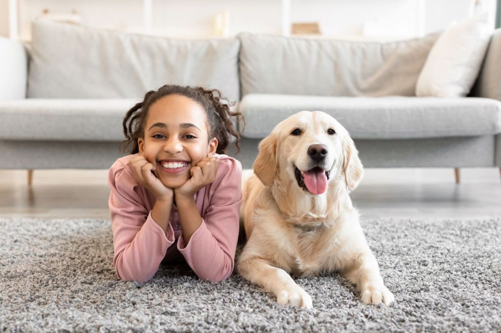 A young girl and her pet protected by life insurance