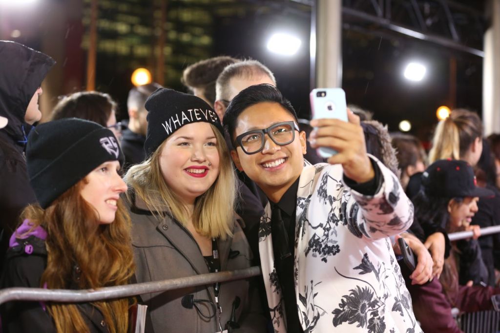 YouTube influencer, Andrew Gunadie/Gunnarolla, takes selfie with young teen fans