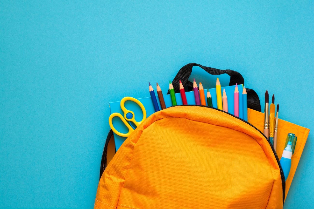 backpack with back to school stationery supplies