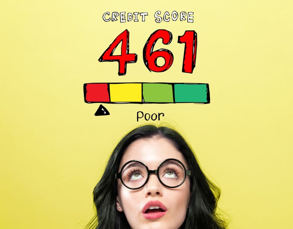 Young woman with glasses looks up at caption saying "credit score 461" 