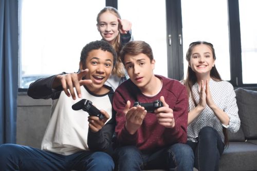 Group of teens playing video games
