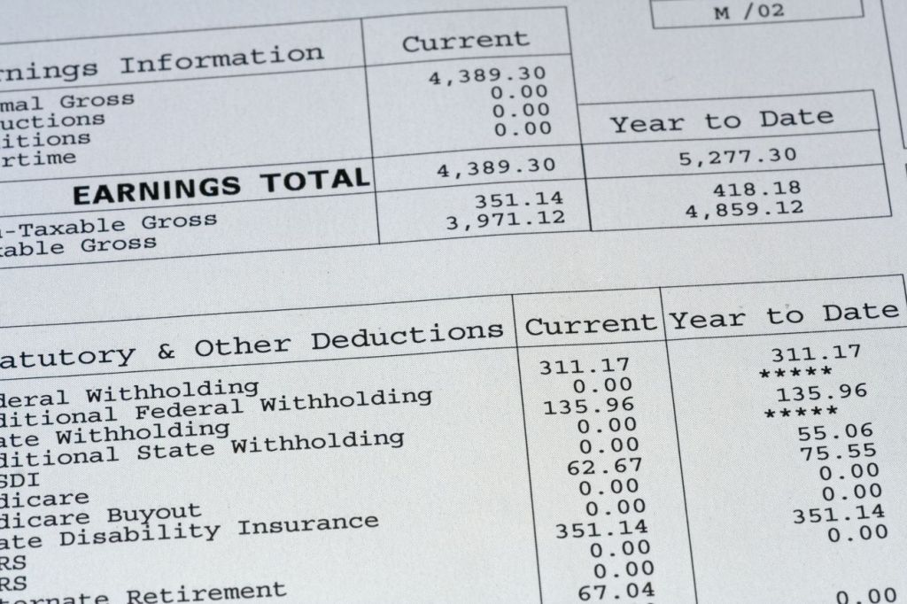 pay stub with lines of text showing deductions and amounts