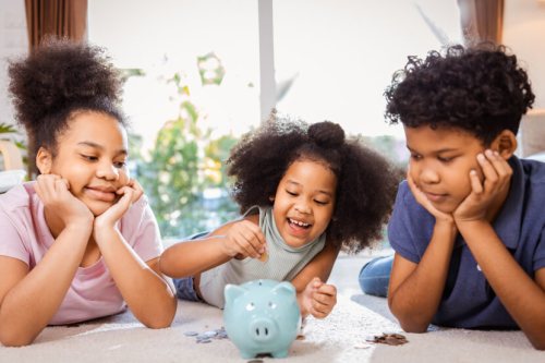 Kids using piggybank