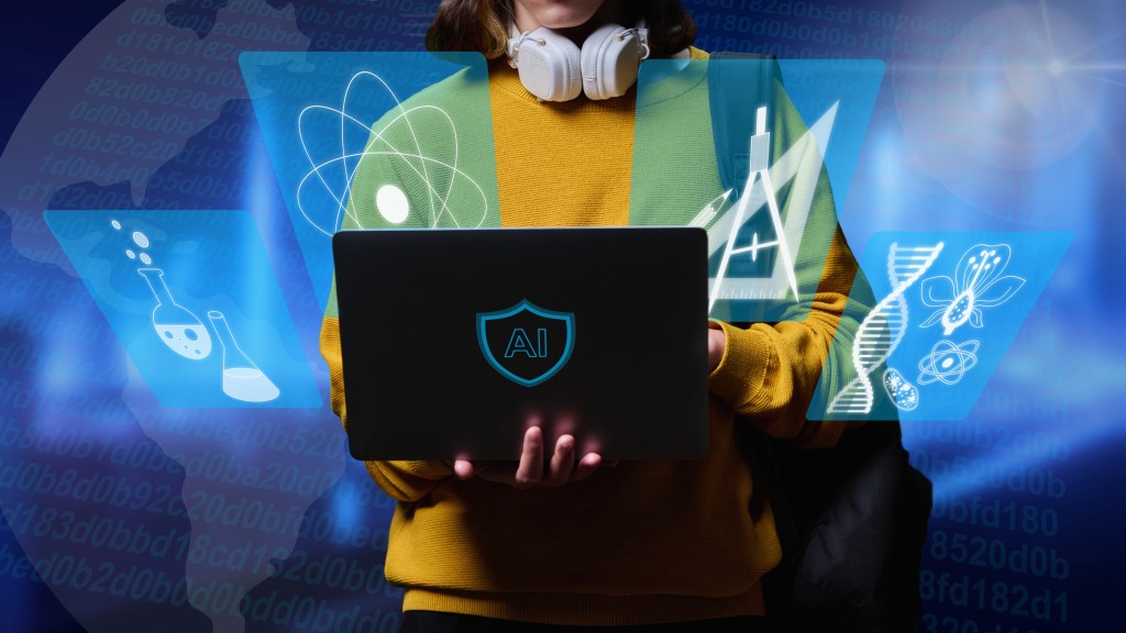 Teen boy wearing headphones and holding a laptop with the letter "AI' on it