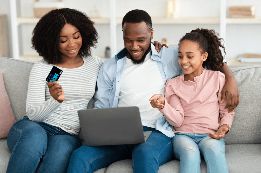 Teen girl and parents shopping online safely with her Mydoh card