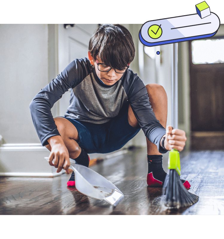 Boy sweeping floor