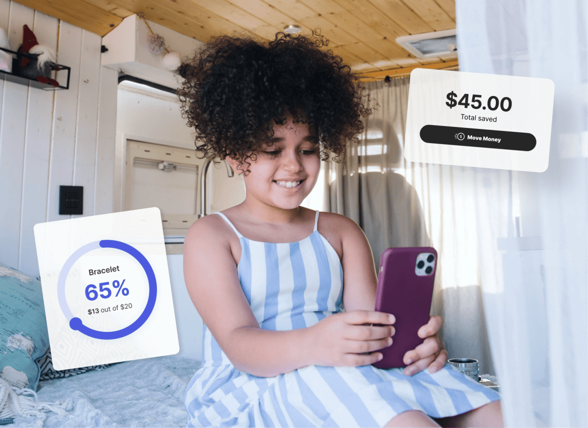 A child views her progress towards her savings goal in the Mydoh app